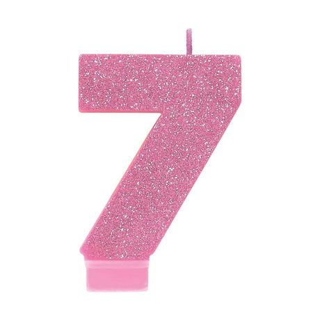 #7 Pink Glitter Numeral Candle, 8cm tall, adds sparkle to birthday cakes and celebrations with its vibrant pink glitter finish.