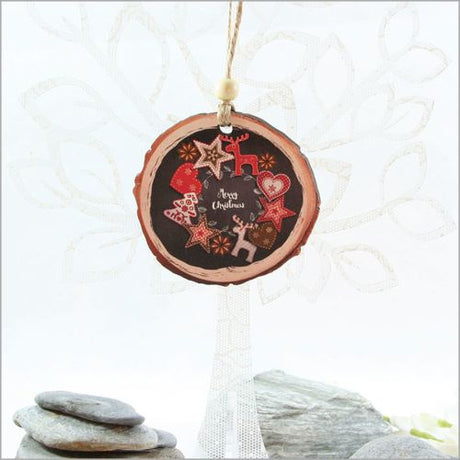 Rustic red and black wood slice ornament, laser-cut designs perfect for Christmas trees and festive gifts.