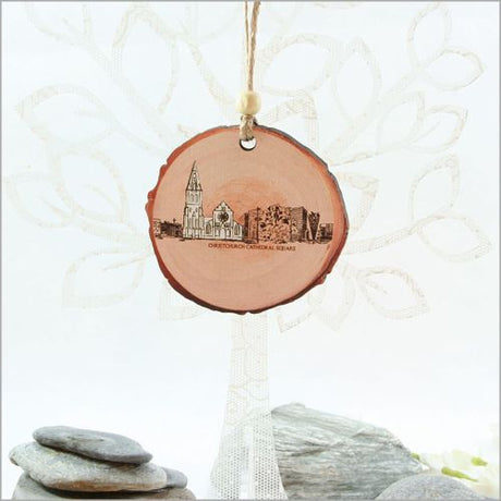 Wood slice ornament featuring Christchurch's landscapes, ideal for festive decor and unique holiday gifts.