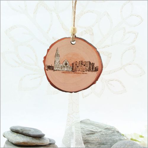 Wood slice ornament featuring Christchurch's landscapes, ideal for festive decor and unique holiday gifts.