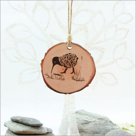 Handcrafted filigree kiwi wood slice ornament, 80mm x 75mm, featuring vibrant dual-sided print for festive decor.