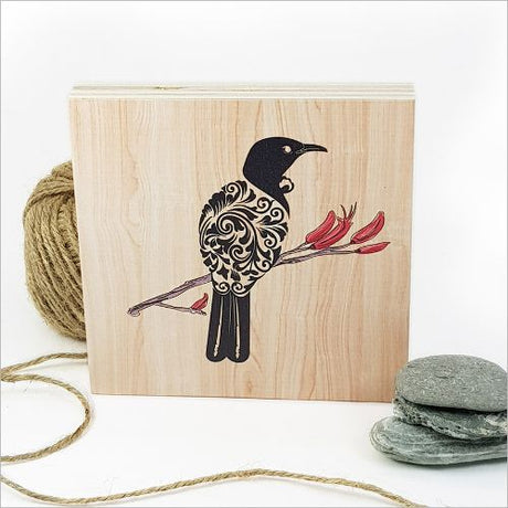 Kiwiana wall art featuring a filigree Tui bird design on eco-friendly plywood, perfect for enhancing any indoor space.