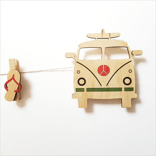 Surfer Van Art Pegs with string for displaying photos and notes, adding coastal charm to any room.