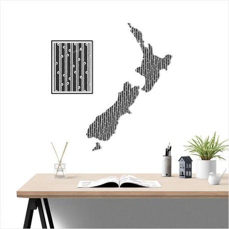 Large black and white NZ map wall art featuring a Koru pattern, crafted from durable Aluminium Composite Material, 640mm x 900mm.