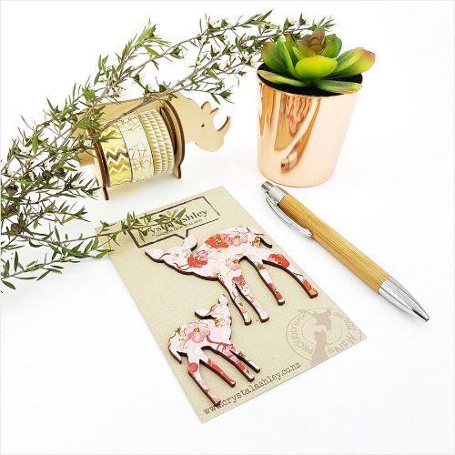 Charming MDF wall art featuring Bambi with pink floral accents, perfect for nurseries and children's rooms.