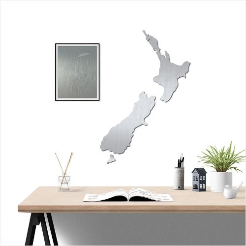Large brushed silver New Zealand map wall art in ACM, featuring intricate cut-outs and perfect for indoor or covered outdoor display.