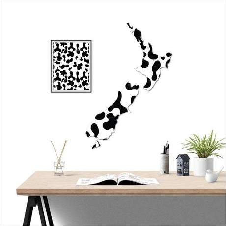 Kiwiana Wall Art featuring a large NZ map with a unique cow skin pattern, crafted from durable Aluminium Composite Material.