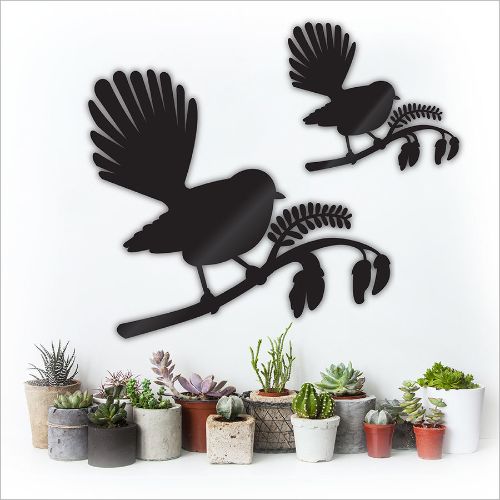 Kiwiana wall art featuring a Fantail bird on a Kowhai tree, crafted from durable Aluminium Composite Material.
