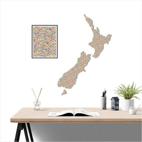 Large New Zealand map wall art featuring a vibrant feather pattern, crafted from durable aluminium composite material.