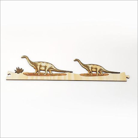 Pine jigsaw strip featuring large dinosaurs, crafted from eco-friendly pine veneer for fun and engaging play.
