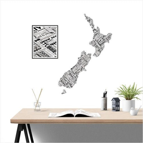 Kiwiana Wall Art featuring a large NZ map in a newspaper pattern, crafted from durable Aluminium Composite Material.