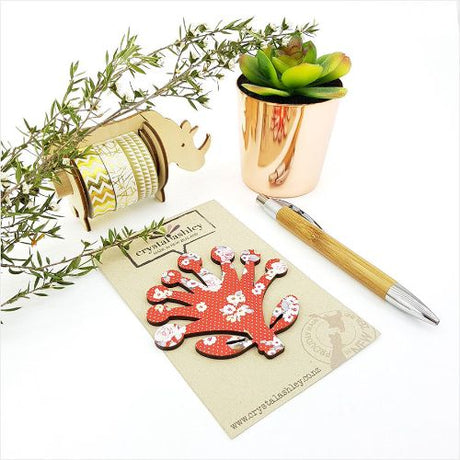 Vibrant red Pohutukawa floral wall art in mini shapes, crafted from lightweight MDF, ideal for home decor enhancement.