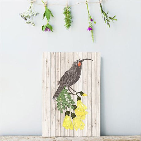 Kiwiana Wall Art featuring Huia design on lightweight plywood, 205mm x 288mm, pre-drilled for easy hanging.