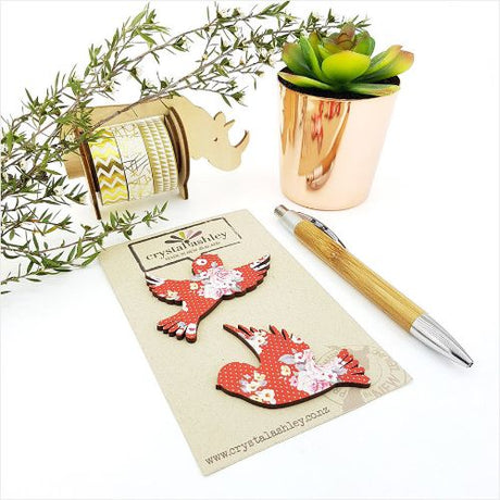 Wall art featuring sparrows on a vibrant red floral backdrop, ideal for adding charm to any interior space.