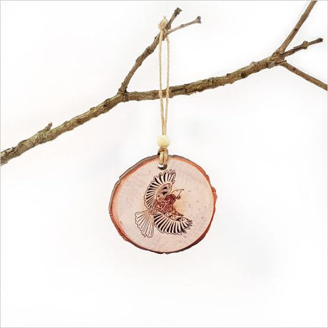KWW Tui Wood Slice Ornament featuring intricate laser-cut design, eco-friendly wood veneer, perfect for holiday decor.
