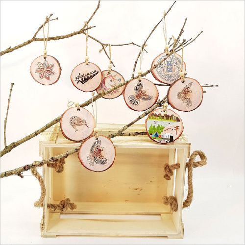KWW Fantail Wood Slice Ornament with intricate designs, perfect for holiday decor and sustainable gifting.