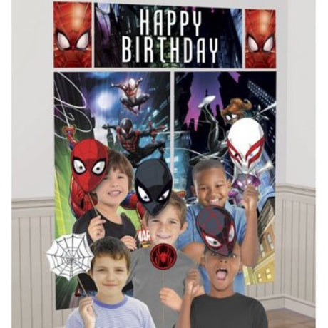 Spiderman Webbed Scene Setter Kit with 17 pieces includes vibrant decorations and photo props for superhero-themed parties.