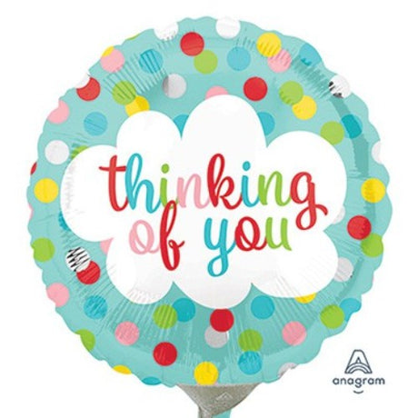 Vibrant 22cm foil balloon with charming polka dots, perfect for elevating celebrations and expressing love.