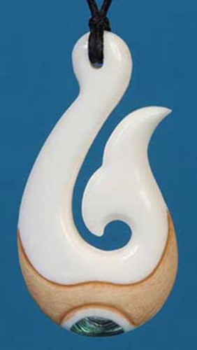 Handcrafted Bone Fish Hook Pendant featuring vibrant paua shell inlays, symbolizing prosperity and connection to New Zealand.