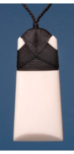 Medium Plain Toki Pendant in bone, reflecting Maori craftsmanship, symbolizing strength and cultural pride.