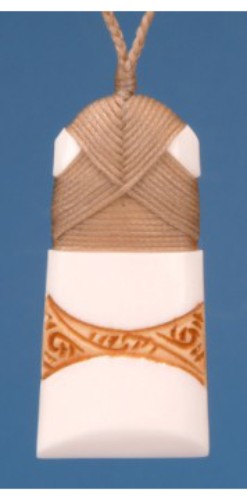 Small stained Toki pendant, a unique Maori jewellery piece symbolizing strength and crafted with traditional artistry.