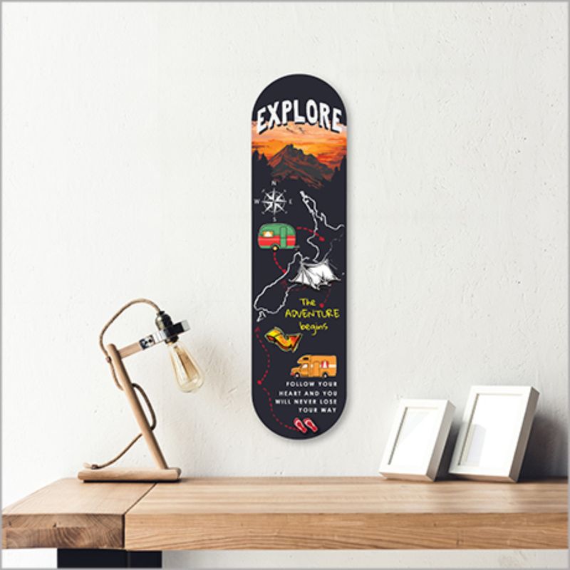 Vibrant 50cm ACM skateboard art featuring a round 'Explore NZ' design, perfect for indoor or outdoor décor.
