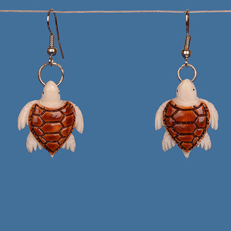 Handcrafted Bone Turtle Design Earrings, 25mm x 20mm, showcasing unique Maori carvings and cultural significance.