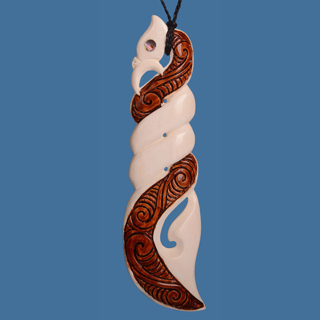 Intricately crafted Bone Manaia Twist Earrings, blending Maori culture with modern design, symbolizing connection and growth.
