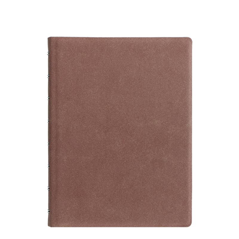 Stylish terracotta A5 notebook with lined pages, refillable design, and a twin wire spine for easy writing.