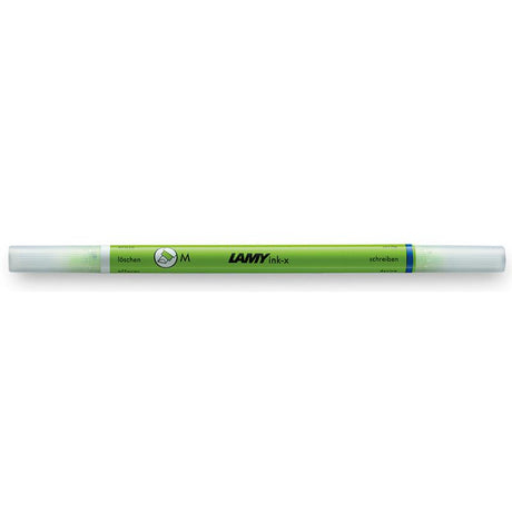 Lamy Ink-x Correction Pen in green with broad nib for smooth corrections, featuring dual-end design with eraser and blue tip.