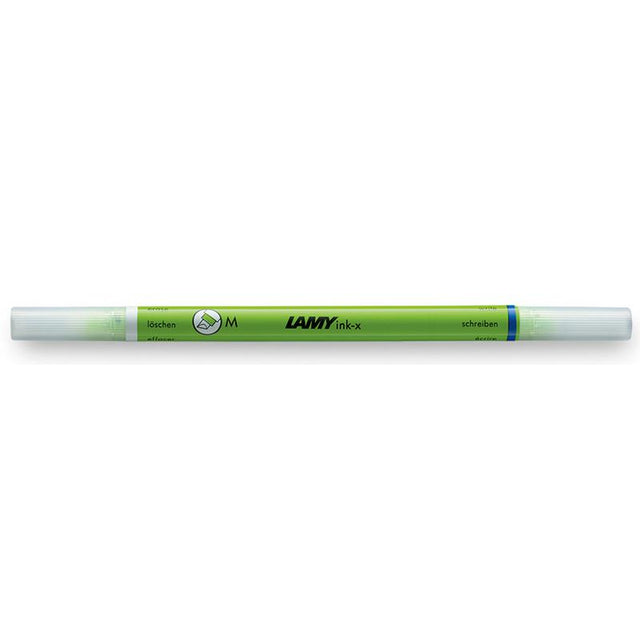 Lamy Ink-x Correction Pen in green with broad nib for smooth corrections, featuring dual-end design with eraser and blue tip.