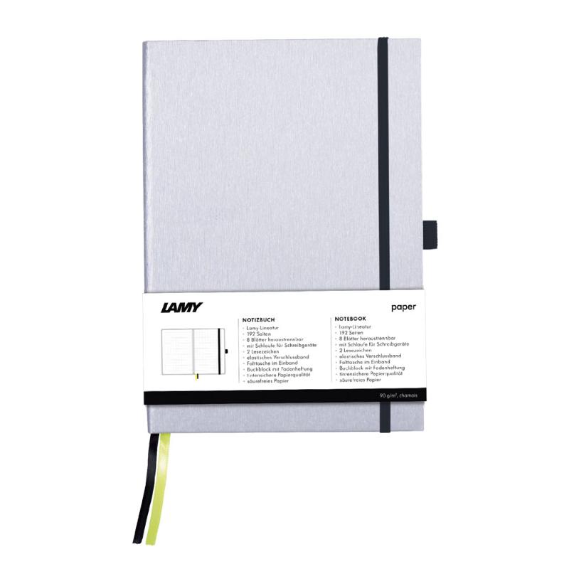 Lamy A6 Notebook in silver with black edges, featuring durable hardcover, bleedproof pages, and built-in pen loop.
