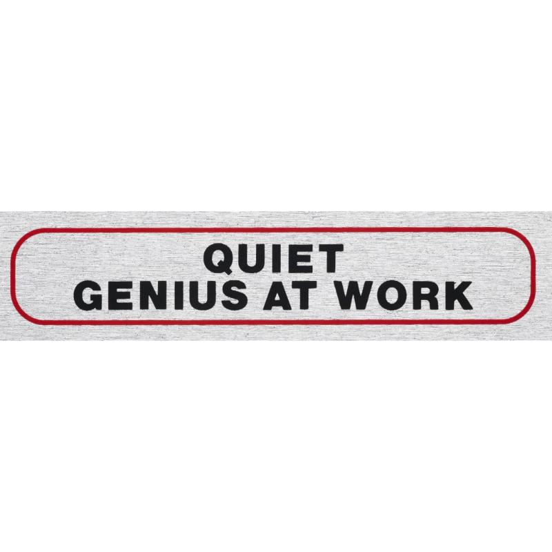 Self-adhesive Quiet Genius At Work sign in brushed aluminum, perfect for reducing distractions in workspaces.