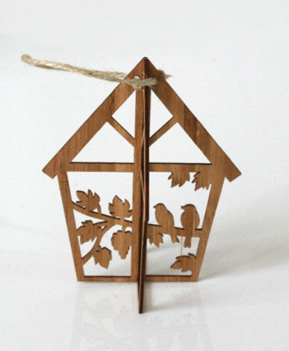 Charming eco-friendly bamboo birdhouse ornament, handcrafted for outdoor decor and attracting birds to your garden.