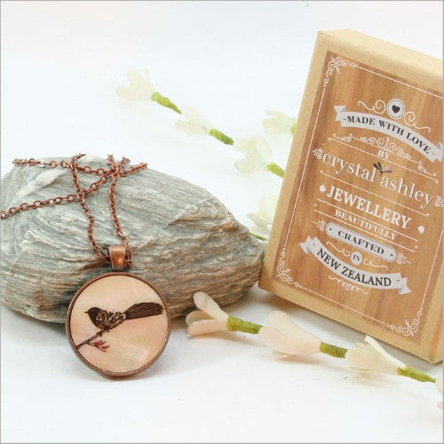 Elegant Circle Pendant Necklace with filigree design on mother of pearl, includes 75cm chain, 30mm diameter pendant.