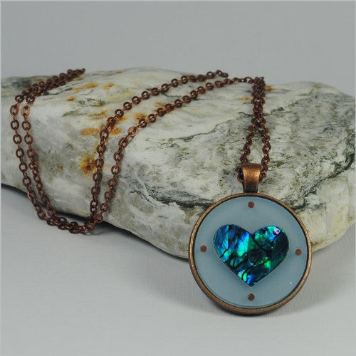 Circle Pendant Necklace featuring a vibrant Paua Heart Blue shell design, set on a 75cm chain, ideal for any occasion.