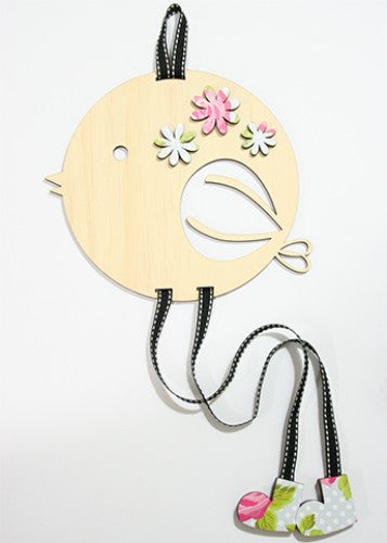 Charming bird-shaped hair clip holder made of pink rose MDF, perfect for organizing accessories and brightening decor.