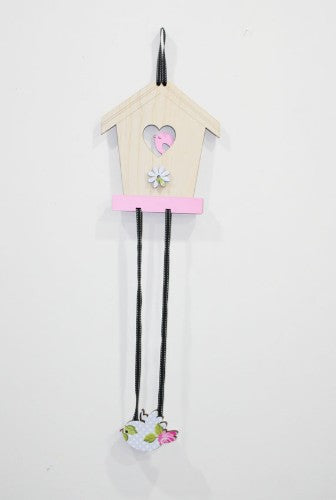Charming Birdhouse hair accessory organizer in pink rose MDF and pine, perfect for tidying hair clips and bands.