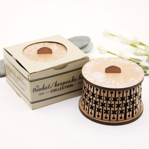 Elegant round trinket box made from NZ Beech veneer, featuring a unique fantasized design, ideal for storing keepsakes.