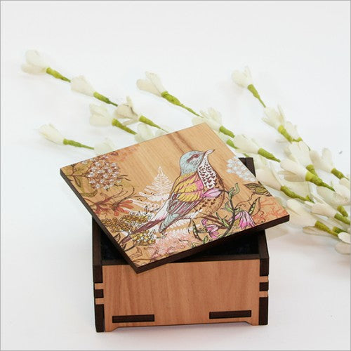 Small trinket box featuring a bird design, crafted from NZ Silver Beech veneer, ideal for storing keepsakes nicely.
