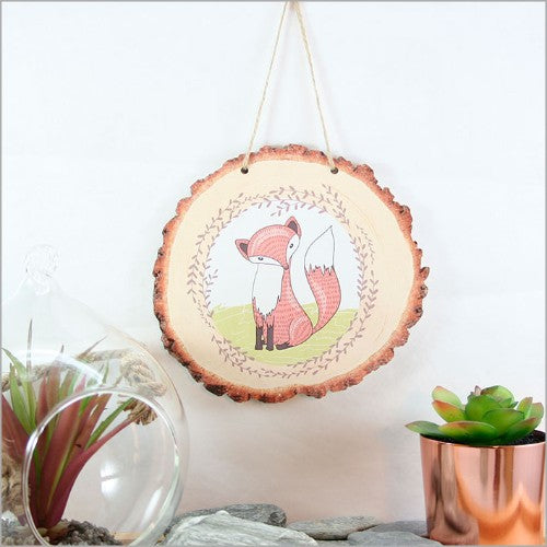 Whimsical Mr. Fox illustration on wood slice wall art, perfect for adding rustic charm to any room.
