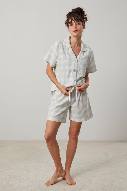 Lena blue and white check short PJ set features a short sleeve top and elastic waist shorts, made from cotton-linen blend.