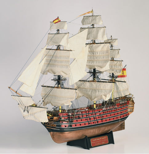 Detailed wooden model of the Santisima Trinidad galleon, showcasing intricate rigging and historical design elements.