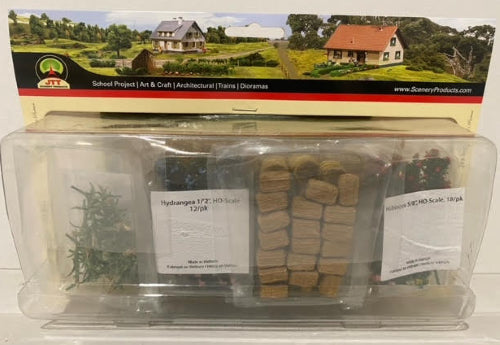 Hornby Model Scenery Detail Modeling Set featuring realistic trees, flowers, and ground cover for model railway enhancement.