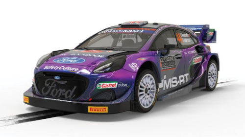Scalextric WRC Ford Puma R1 Greensmith slot car with vibrant design, engineered for speed and precise rally racing.