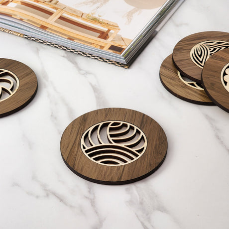Single semi-circle coaster made from reclaimed River Rimu wood, showcasing unique colors and patterns, ideal for drinks.