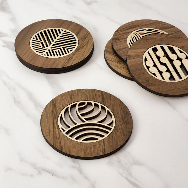 Single semi-circle coaster made from reclaimed New Zealand riverwood, showcasing unique colors and history in every piece.