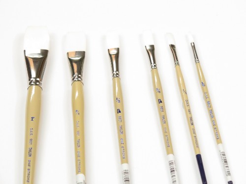Flat 3/8" white taklon artist brush, ideal for watercolor and acrylic painting, featuring durable, resilient filaments.