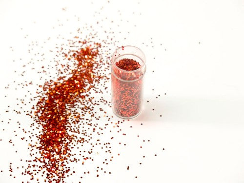 Ultra-fine Marigold glitter in a 10gm container, perfect for enhancing crafts and DIY projects with a touch of sparkle.