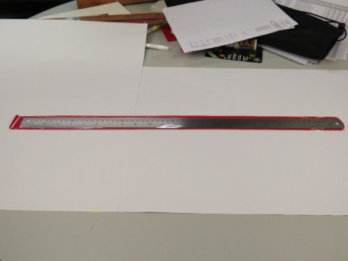 Masters Stainless Steel Ruler 24"/60cm with dual markings for precision measuring in inches and centimeters.